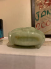 Load image into Gallery viewer, A Chinese carved jade snuff bottle.