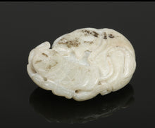 Load image into Gallery viewer, Oval Chinese carved nephrite amulet depicting a figure with a phoenix, bat, carp and string of coins.