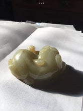 Load image into Gallery viewer, A small Chinese jade figure of a Buddhist lion with  cub.