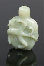 Load image into Gallery viewer, A Chinese carved jade snuff bottle.