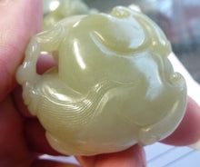 Load image into Gallery viewer, Chinese Nephrite Jade carving of a mythical beast with the flaming pearl.