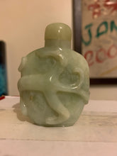 Load image into Gallery viewer, A Chinese carved jade snuff bottle.