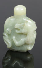 Load image into Gallery viewer, A Chinese carved jade snuff bottle.