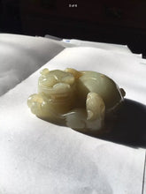 Load image into Gallery viewer, A small Chinese jade figure of a Buddhist lion with  cub.