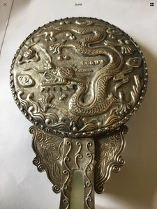 Antique Silver backed Chinese circular hand mirror with jade belt hook handle.