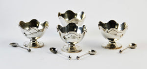 A cased set of Edwardian Silver salts  & spoons, by Charles Edwards ,London 1906