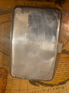 A Thai silver rounded rectangular cigarette case