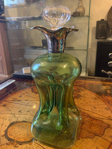 An Edwardian silver mounted green glass glug decanter, William Comyns London 1905