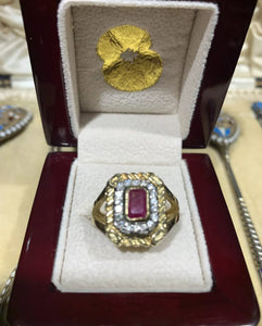 A beautiful 18k Gold Ruby & Diamond octagonal cluster ring