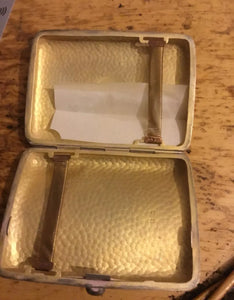 An Edward VII silver cigarette case by H.V. Pithey & Co, Birmingham 1909, gilt interior.