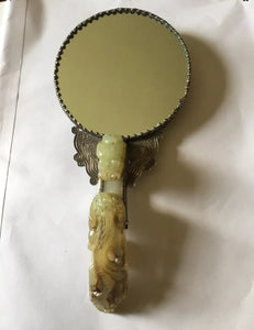 Antique Silver backed Chinese circular hand mirror with jade belt hook handle.