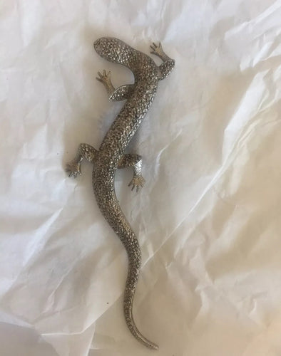 a pair of scissors on a white cloth 