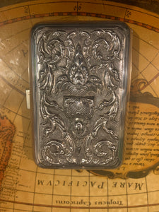 A Thai silver rounded rectangular cigarette case