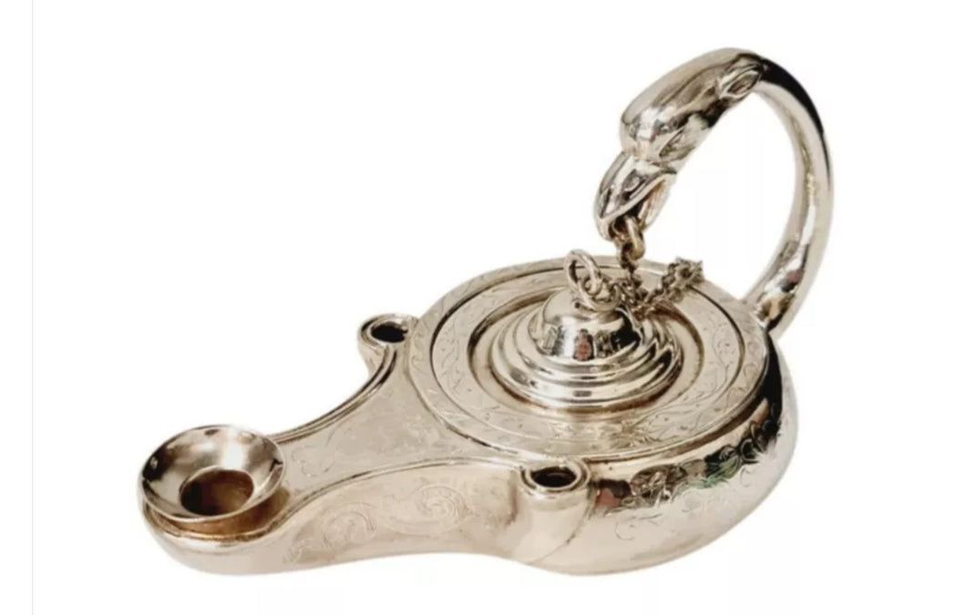 Victorian silver inkwell of Museum quality modelled as an Aladdin's lamp with part engraved decoration and eagles head, London 1868, James Charles Edington