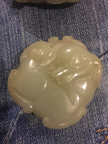 Chinese nephrite/jade carving of a recumbent dog.