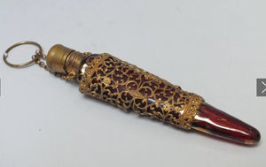 A ruby glass scent flask.