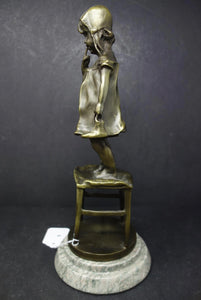 Bronze Statue of a Timid Girl standing on a chair. Reproduction signed cast Juan Clara 1875-1958