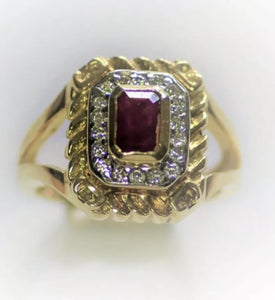 A beautiful 18k Gold Ruby & Diamond octagonal cluster ring