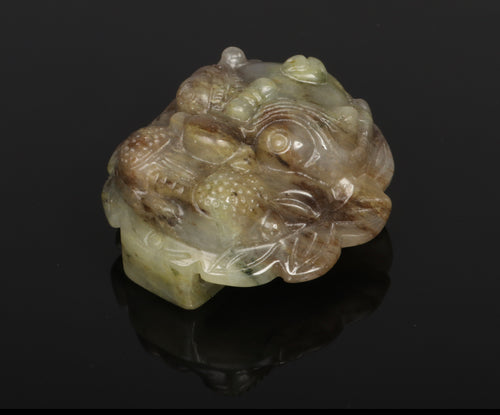 A Chinese 19th century  carved jade buckle..
