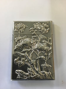 A  Chinese export silver rectangular card case dragon and prunus flowers.