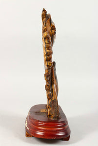 Chinese carved tiger's eye scalar or sailfin fish group on stand.