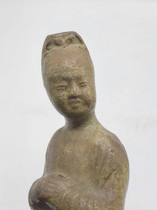 A straw-glazed figure of an attendant. c. Sui Dynasty (541-604)