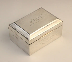 A George V silver cigarette box by F H Adams & Co, Birmingham 1922