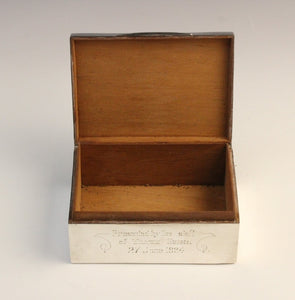 A George V silver cigarette box by F H Adams & Co, Birmingham 1922