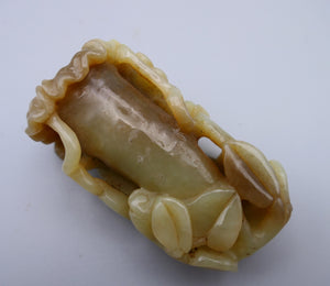 Chinese nephrite jade carving of flowers around a central container