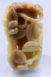 Chinese nephrite jade carving of flowers around a central container