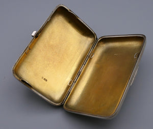 Russian silver cigar case with silver-gilt interior, the top is engraved with a Cyrillic inscription.