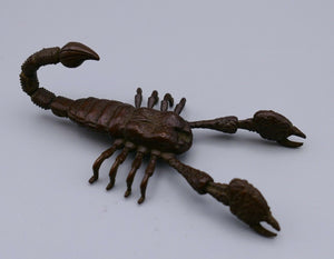A copper/bronze model of a scorpion